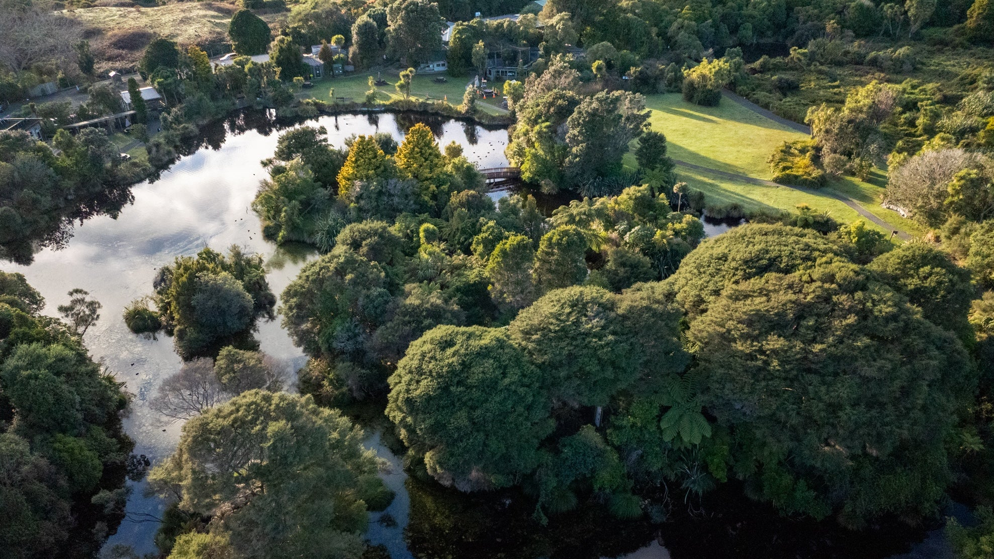 Drone shot of the open spaces for events, islands and bridges connecting them at Ngā Manu Nature Reserve in Waikanae on the Kāpiti Coast. 