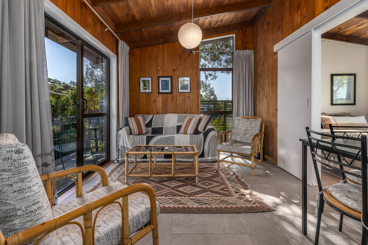 The lounge in Theo's Cottage an overnight stay experience at Ngā Manu nature reserve in Waikanae on the Kāpiti coast.