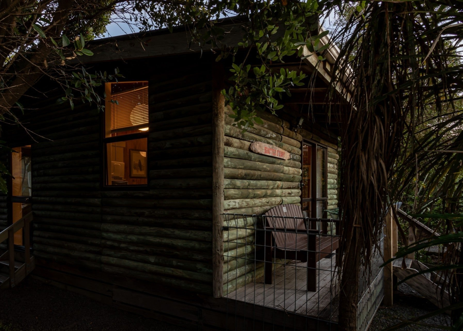 External shot of Theo's cottage at Ngā Manu nature reserve. Used for overnight stay experiences of the Kāpiti Coast. Photography by Red Beanie.